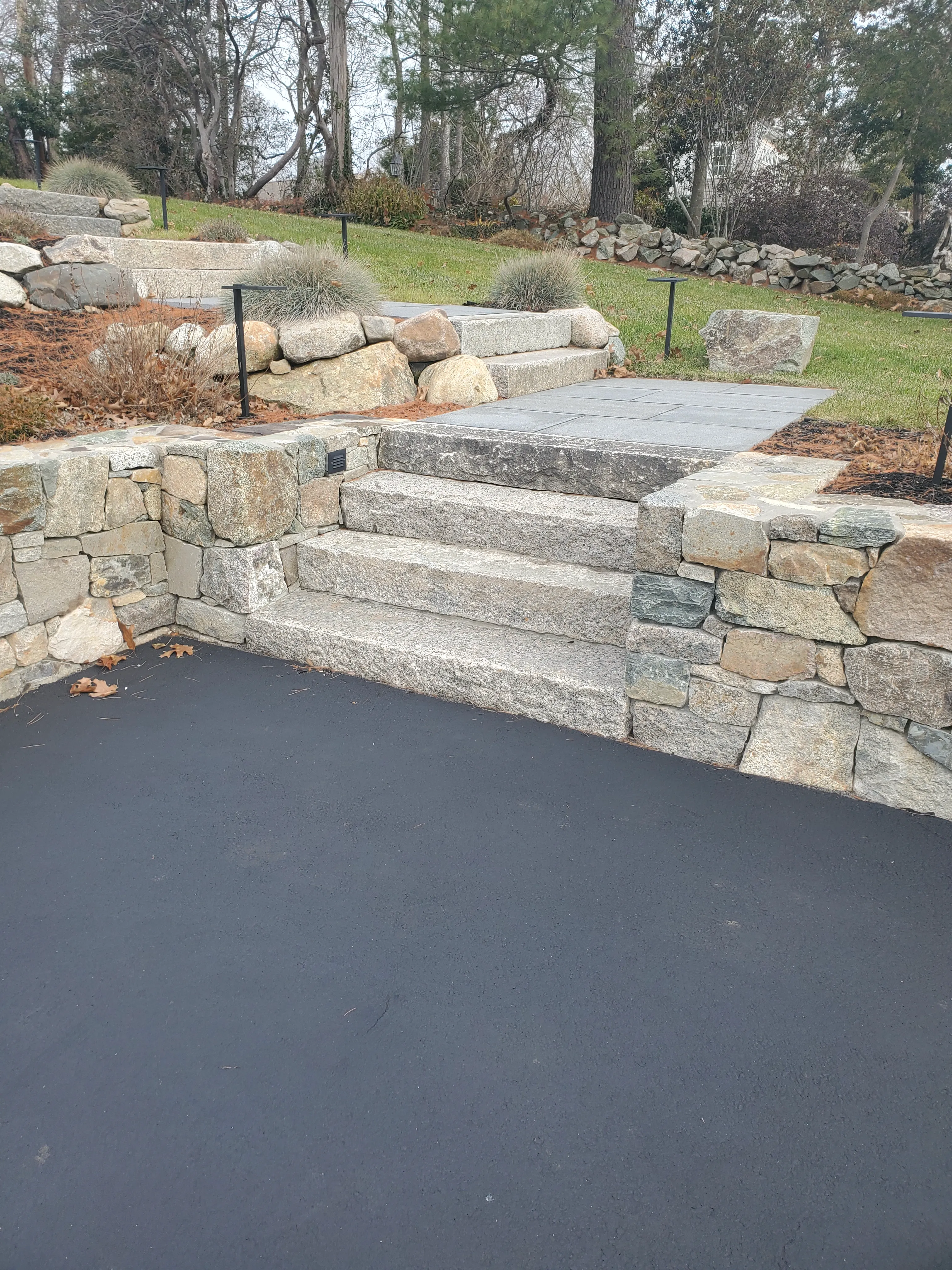 New stone walkway installation in front yard