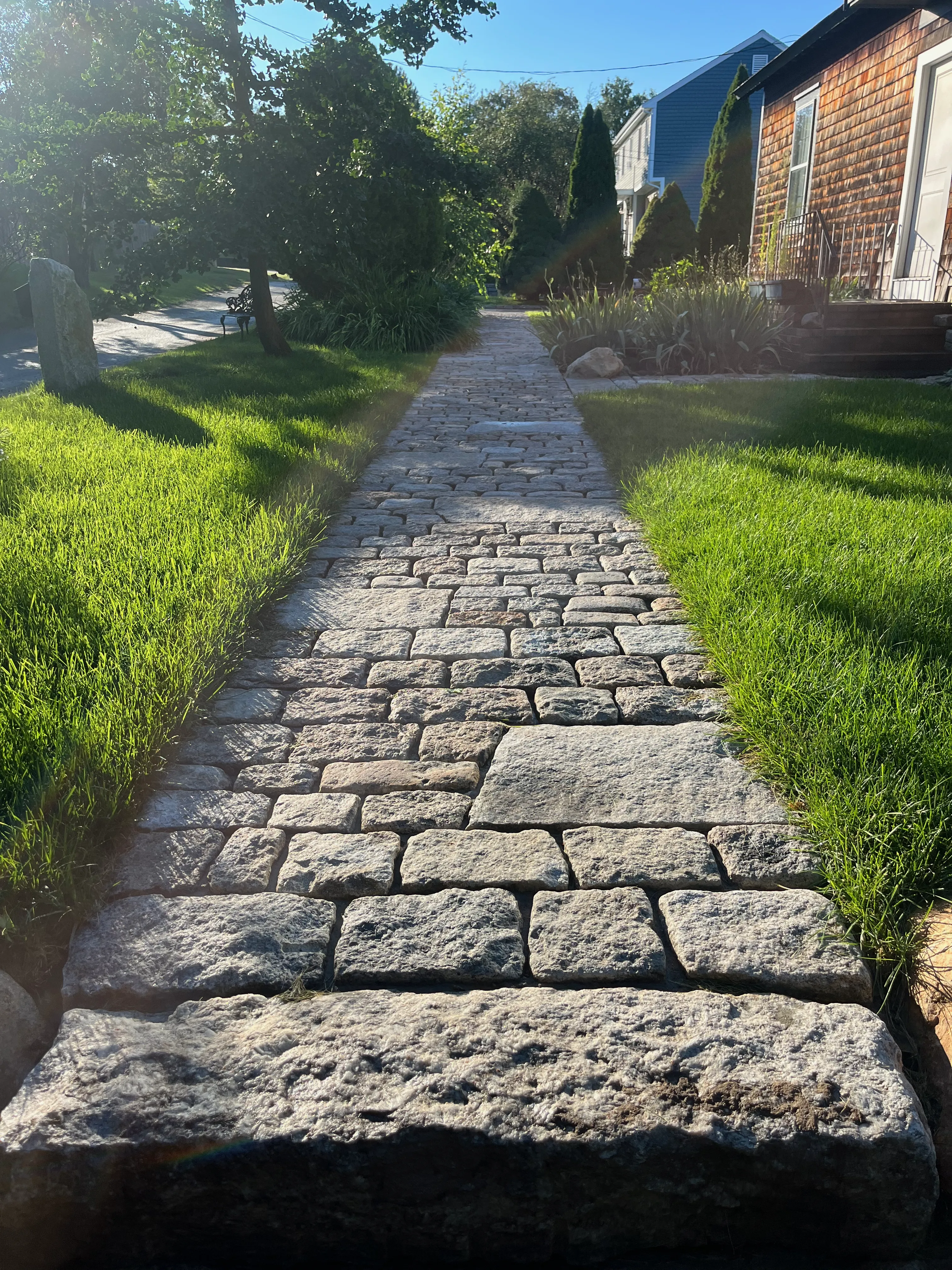 Stone stairway leading to elevated patio